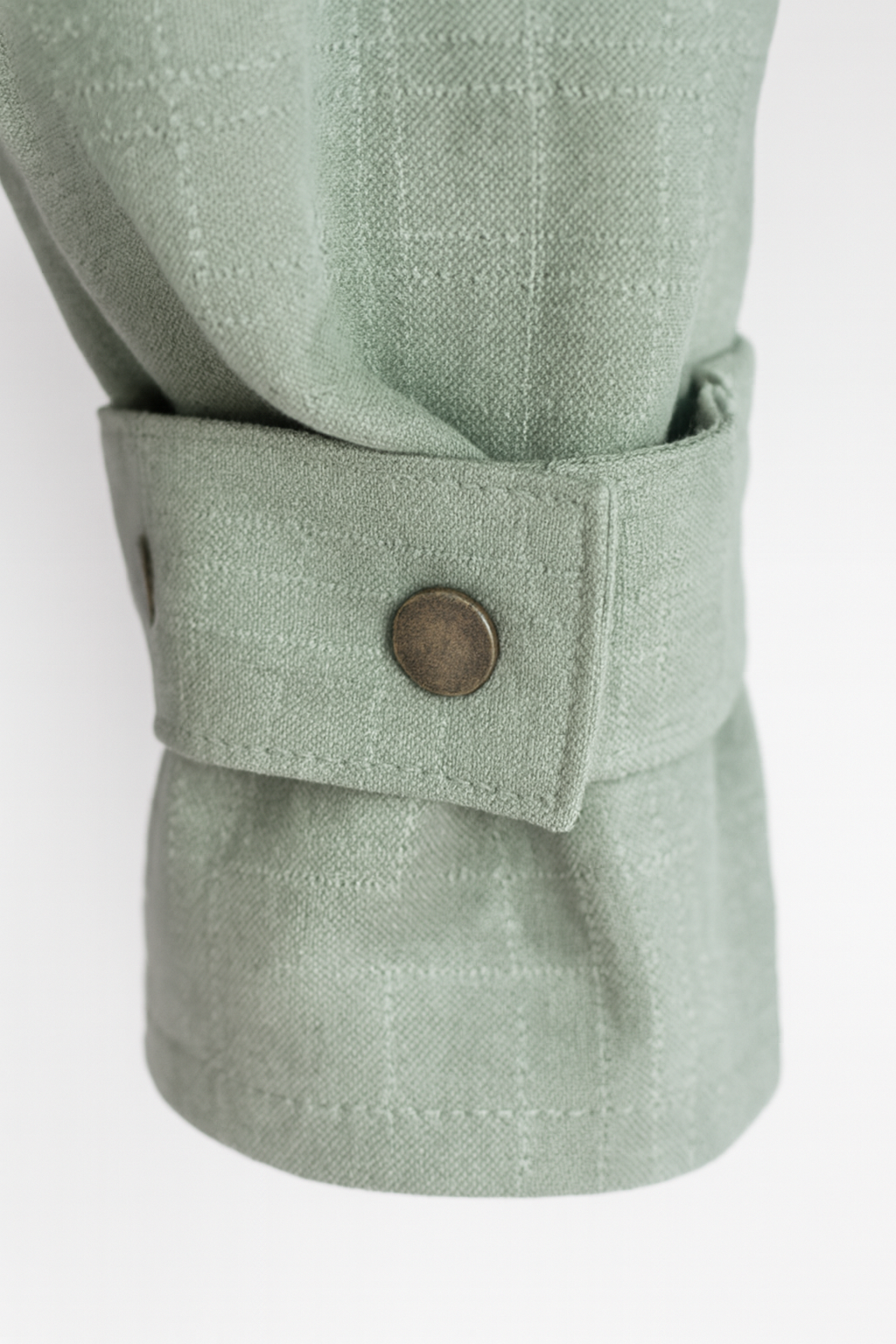 Аёллар учун плаш қул қисмидаги пистони