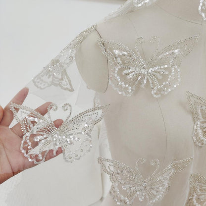 🦋 Тўй либоси учун ялтироқ капалак нашивка — марварид ва пайеткали қўлда тайёрланган безак