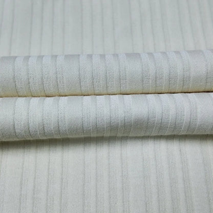 210 г/м² зичликдаги органик 40s рибана жерси мата — 97% пахта ва 3% спандексдан ишланган, юмшоқ, нафас оладиган ва чўзиладиган материал. Футболка ва пижама каби енгил кийимлар учун идеал танлов