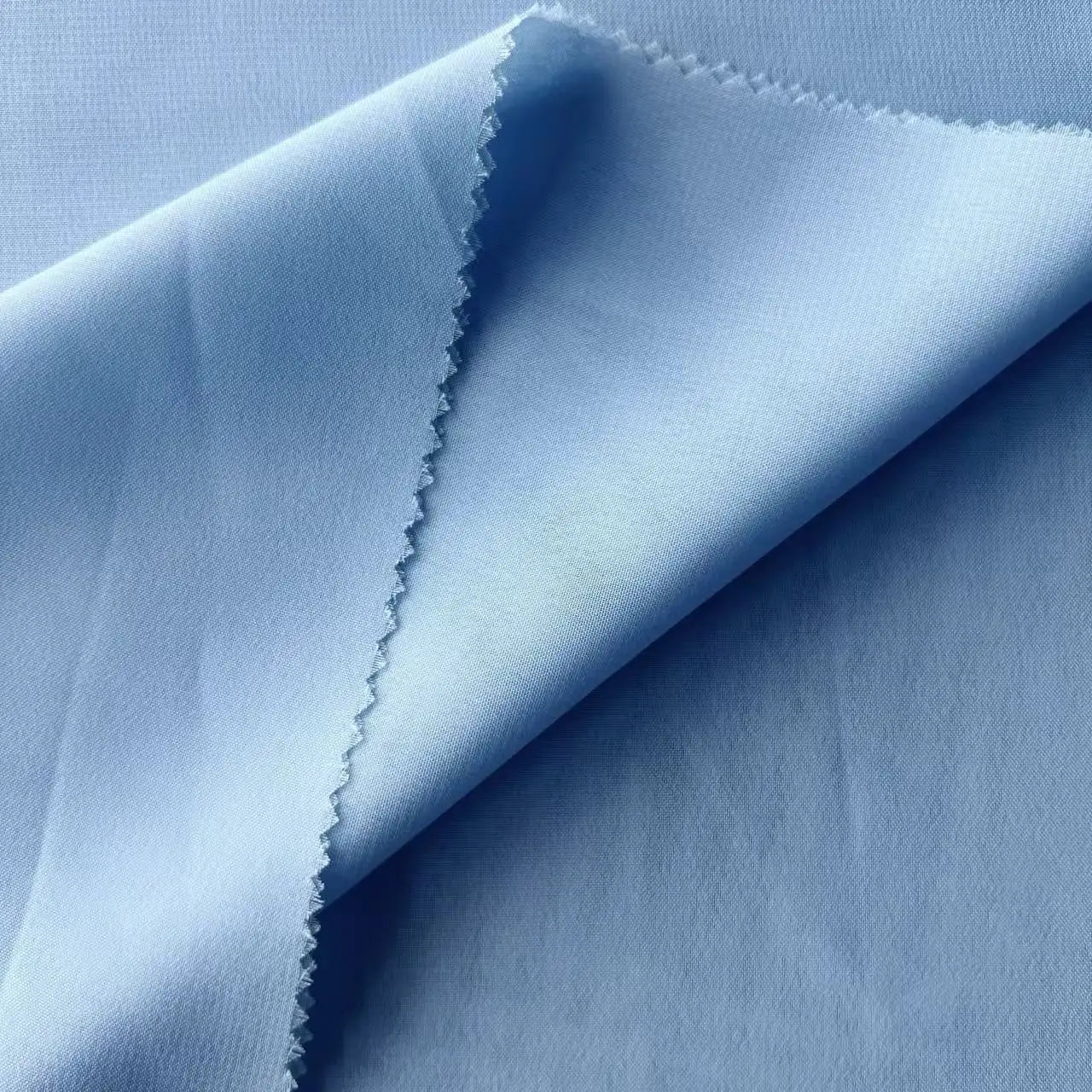 100Д шифонли тўқимачилик кийимлари 100% полестер тўқув матолари аёллар либослари учун астарли мато 8009