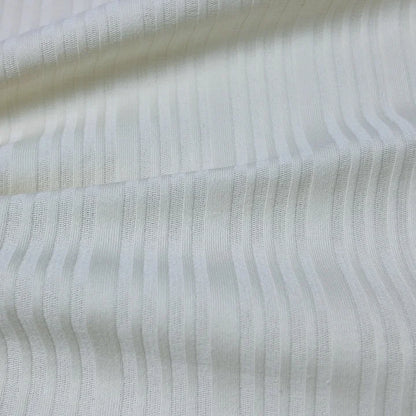 210 г/м² зичликдаги органик 40s рибана жерси мата — 97% пахта ва 3% спандексдан ишланган, юмшоқ, нафас оладиган ва чўзиладиган материал. Футболка ва пижама каби енгил кийимлар учун идеал танлов