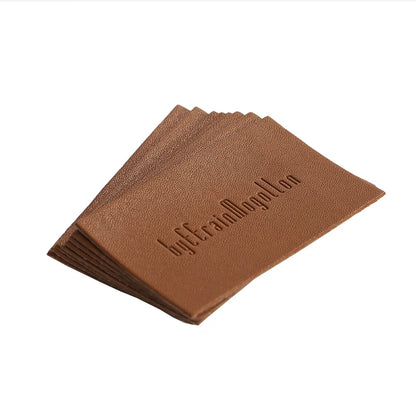 Шляпалар учун махсус жинси тери патч Блинд Эмбосс логотипи ПУ чарм патч