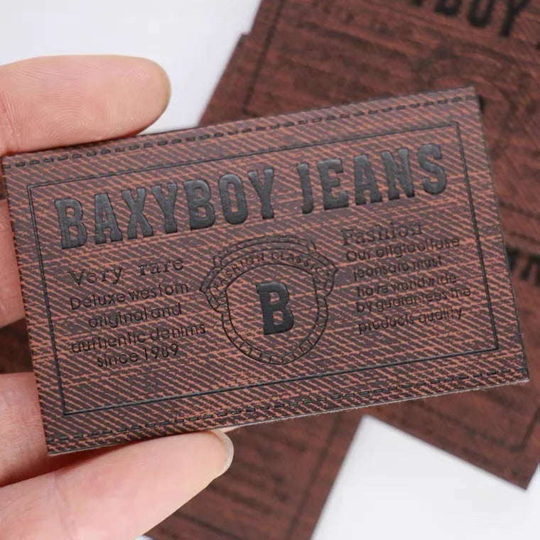 Махсус чарм патч улгуржи фабрикаси бўрттирма логотипи иссиқлик пресси жинси шимлар юк машинаси тери ёрлиқлари