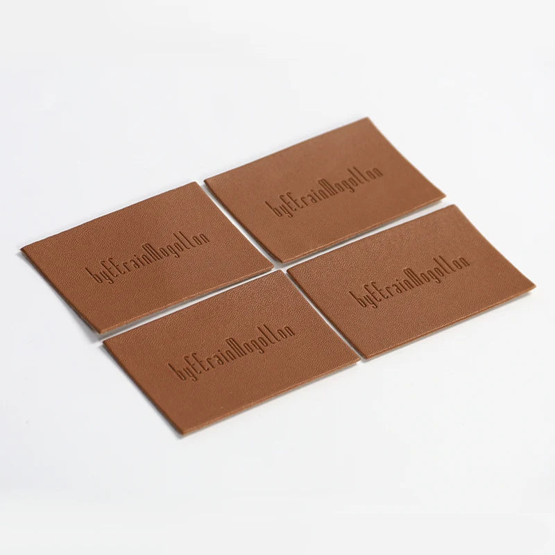 Шляпалар учун махсус жинси тери патч Блинд Эмбосс логотипи ПУ чарм патч