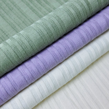 210 г/м² зичликдаги органик 40s рибана жерси мата — 97% пахта ва 3% спандексдан ишланган, юмшоқ, нафас оладиган ва чўзиладиган материал. Футболка ва пижама каби енгил кийимлар учун идеал танлов