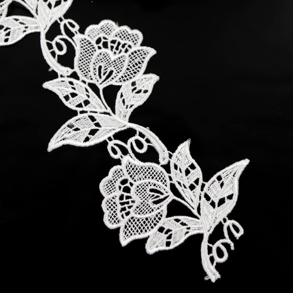 Оқ ва қора гулли гипюр тўр – каштали безак ва аппликация